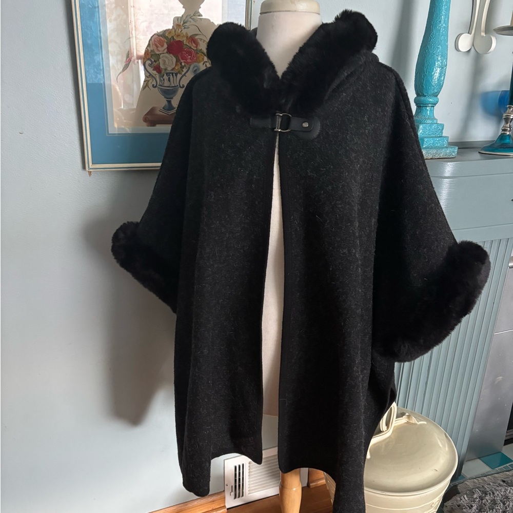 Coco and Carmen Hooded Cape with luxurious faux fur trim.
